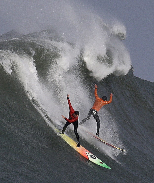 The contest, which has a $125,000 prize pool, is made up of heats, during which surfers try to ride the large waves.