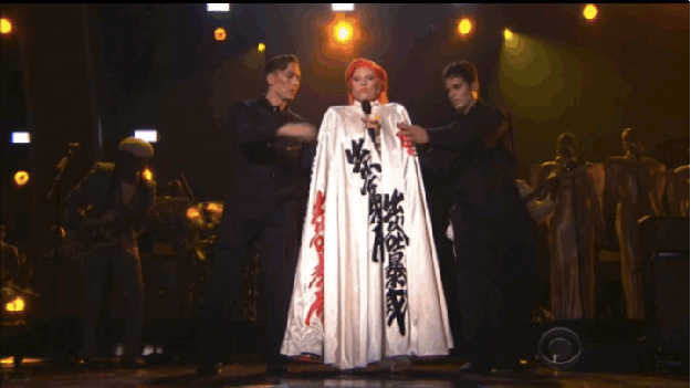 Gaga transitioned into "Ziggy Stardust," which included a quick costume change...