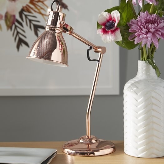 Promising review: "This is a very glam lamp that adds so much panache to my desk. I was confused what type of bulb it needed but finally found the right one." —CnslorPrice: $53.99 (on sale from $95) / Available in copper (pictured), brass, and silver.