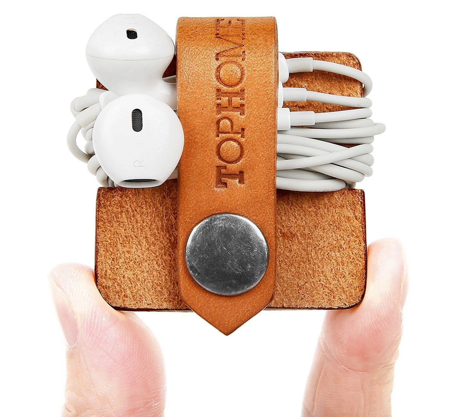 Promising Review: "No more tangled headphone cables! I bought a pair for my desk at home, and I'm purchasing another pair for my office. I love how neat and untangled my earbud cords are when using this organizer. It's leather which I'm sure will last many, many years for such a great price." —Jane MGet it from Amazon for $8. Also available in black.