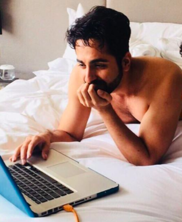 I would love to pretend that he's lovingly reading this post with his shirt off in this super comfy looking bed, but alas.
