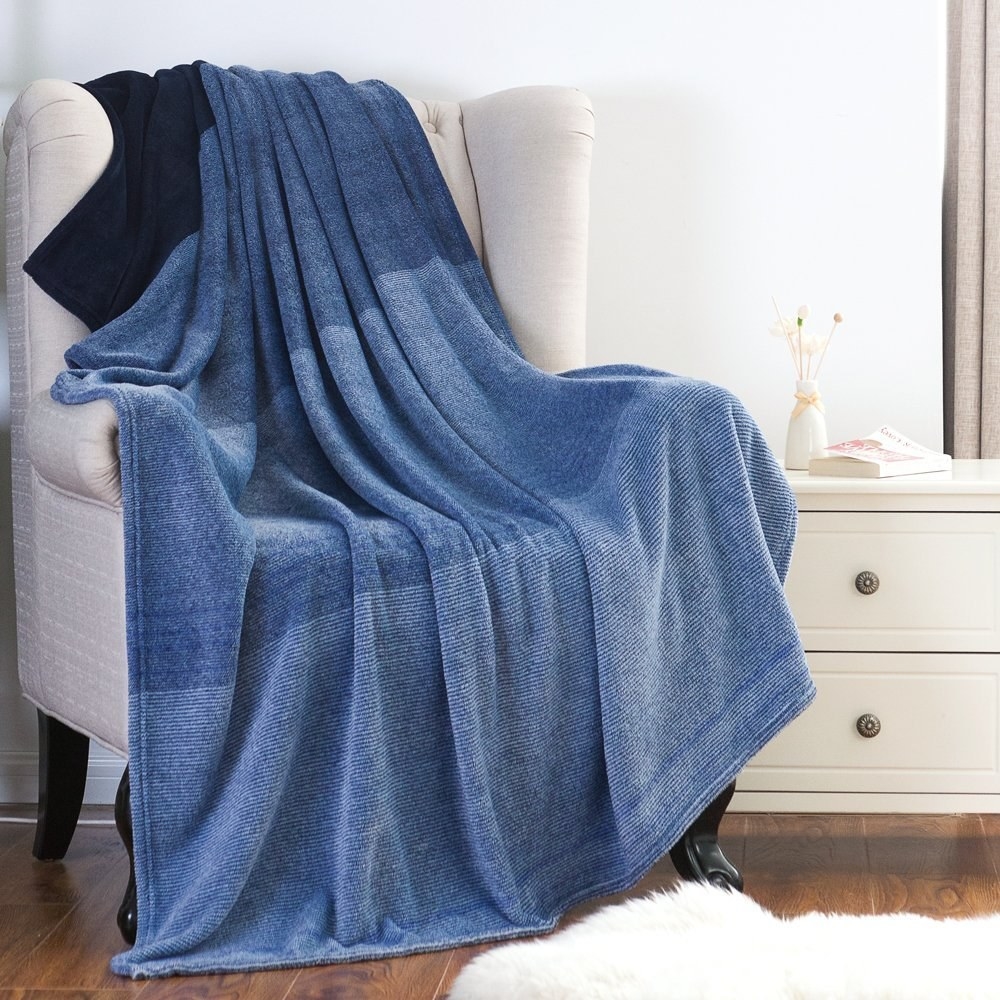 Promising review: "Holy cow! This blanket is amazing. I bought it as a gift and was really sad I couldn't keep it. It's the softest blanket I've felt in a long time. It feels luxurious and not cheaply made. Frankly, I'm gonna buy another one for cuddling on the couch!" —AJMGet it from Amazon for $19.99 (available in 16 colors and four sizes).