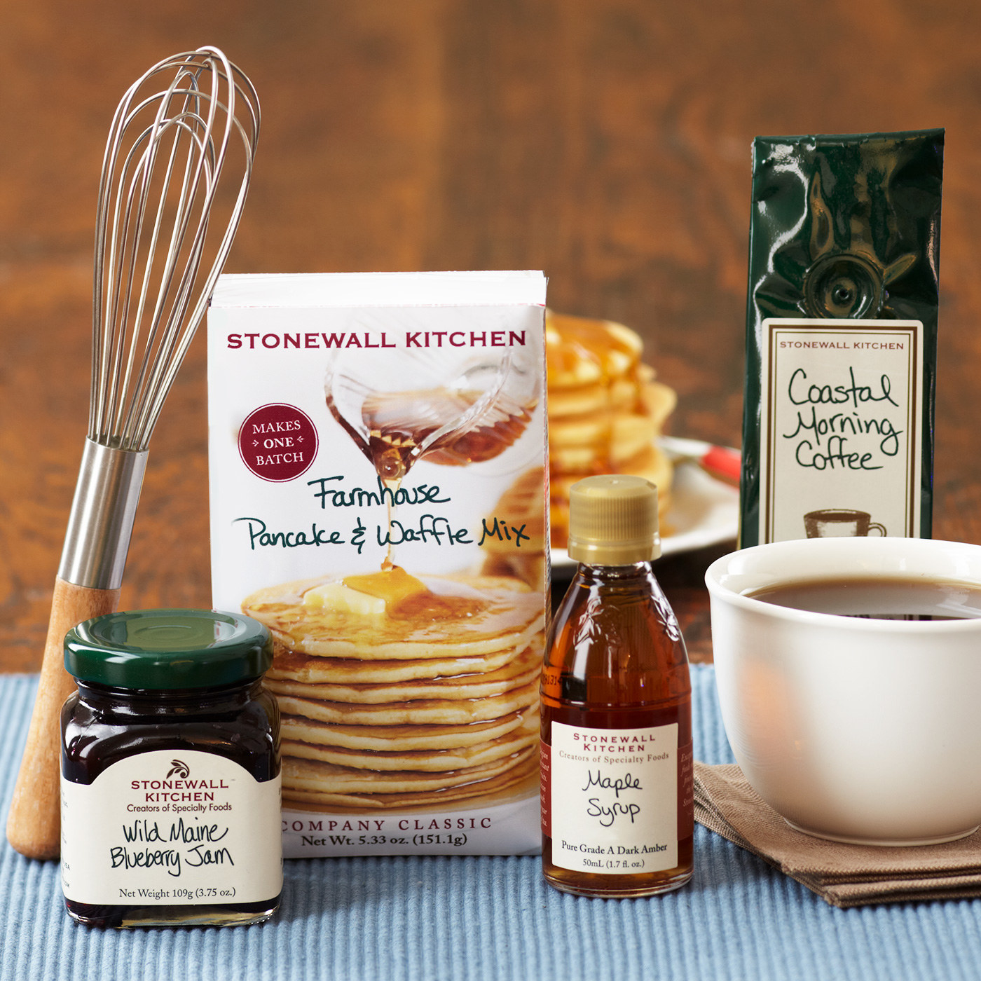 This set includes:–Farmhouse Pancake & Waffle Mix–Wild Maine Blueberry Jam (their top seller)–Maple Syrup–Coastal Morning CoffeeGet it from Stonewall Kitchen for $17.95. For a breakfast for two or more people, try their Down East Breakfast Gift.