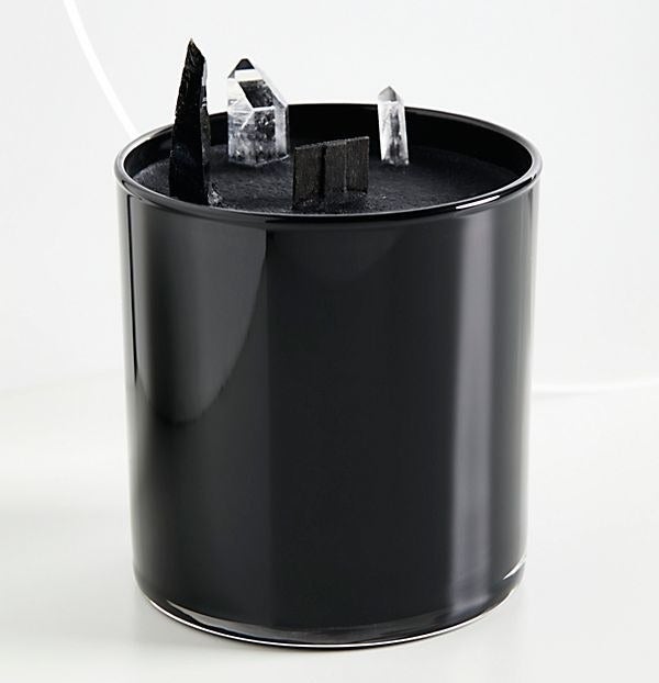 Get it from Free People for $58. Also check out a bigger black candle for a heftier MOOD.