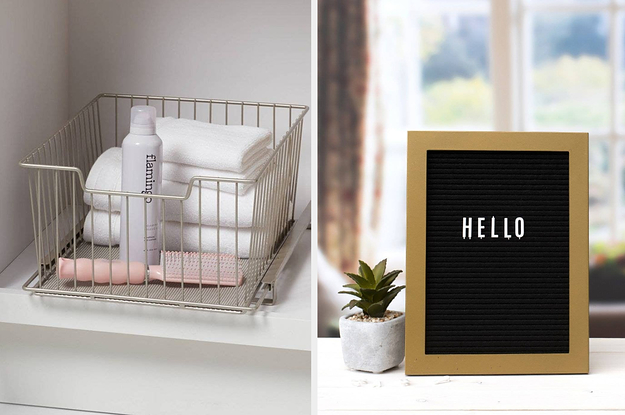 to the left: a wire basket filled with towels, to the right: a letter board sign in a frame