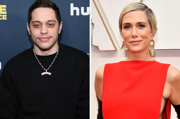 Pete Davidson and Kristen Wiig posing on the red carpet