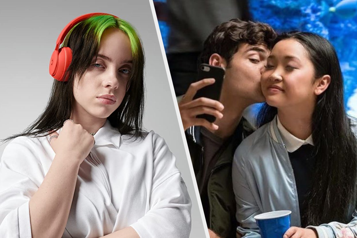Billie Eilish next to a couple taking a photo and kissing