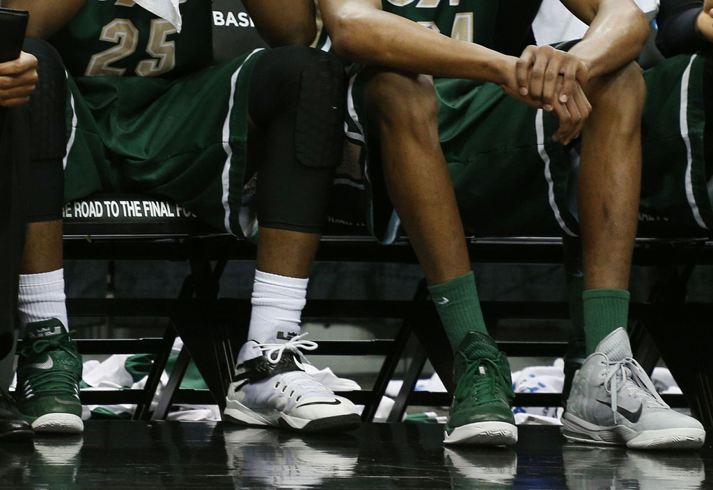 UAB wearing Mismatched Nike Sneakers