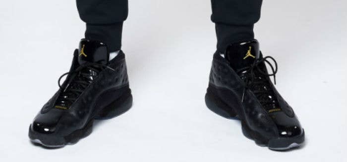 Kawhi Leonard Wearing a Black/Gold Air Jordan 13 Low Sample (2)