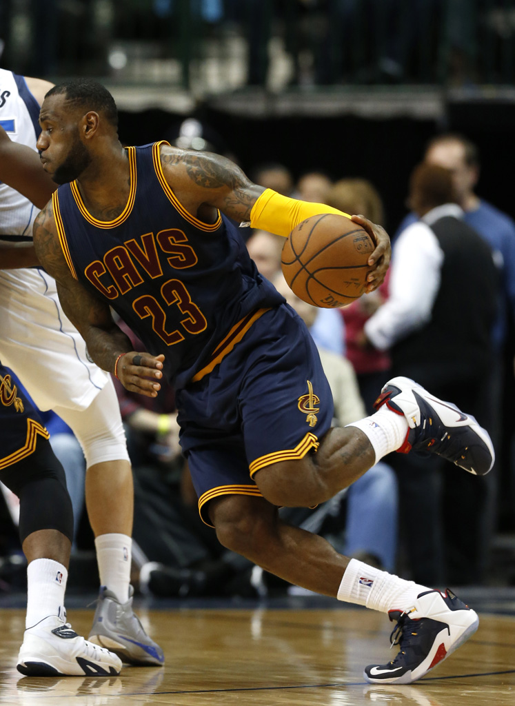 LeBron James wearing Nike LeBron 12 Navy/White-Red-Yellow PE (3)