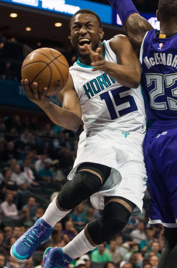 Kemba Walker wearing Under Armour Curry One Hornets Father to Son (2)