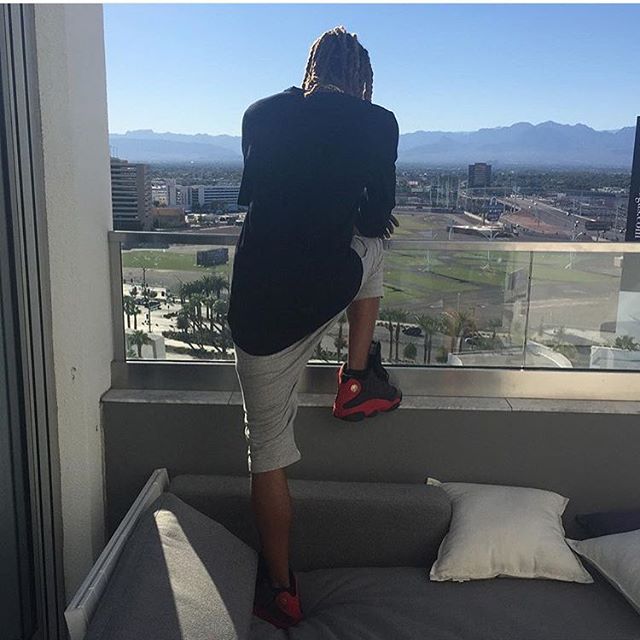 Fetty Wap wearing the &#x27;Bred&#x27; Air Jordan 13