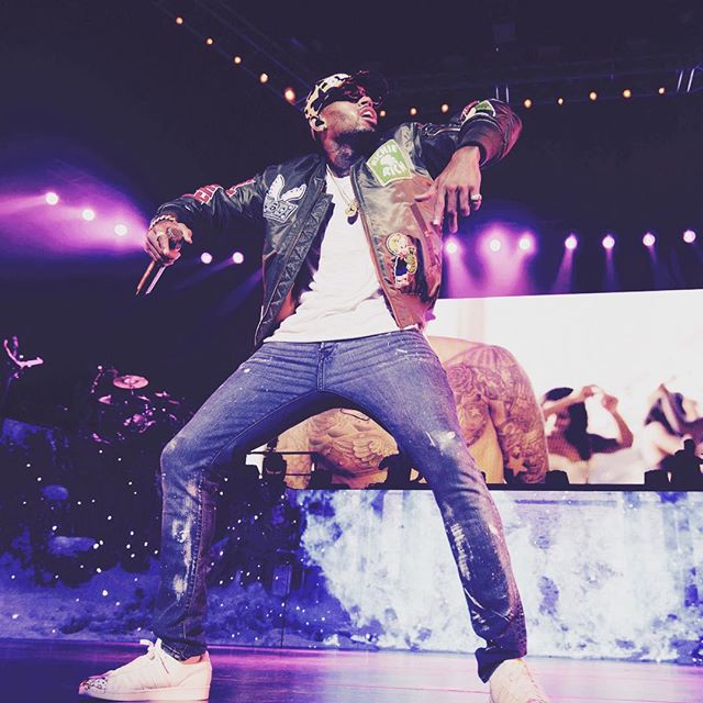 Chris Brown wearing the Pharrell x adidas Supershell