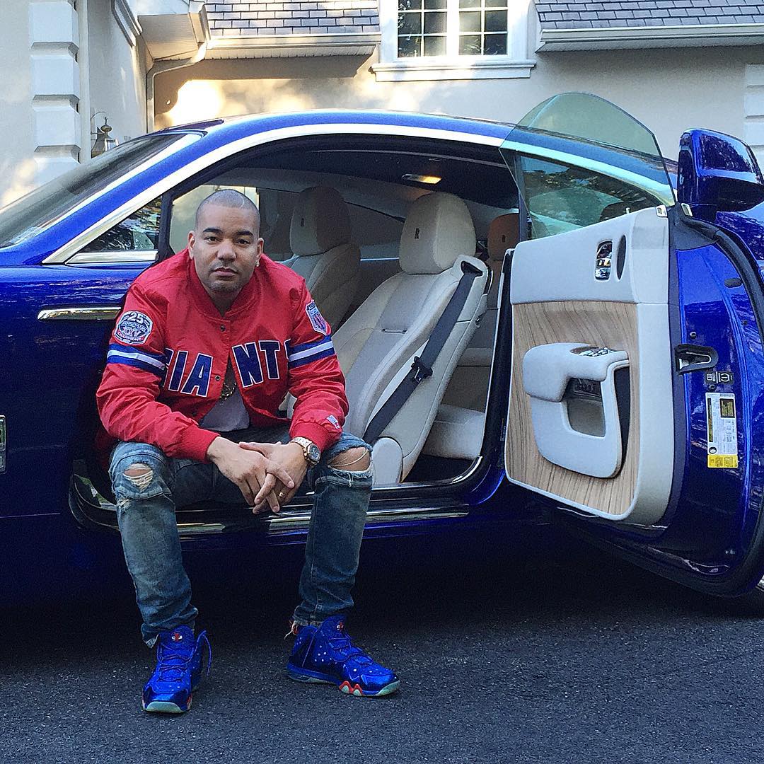 DJ Envy wearing the &#x27;Sixers&#x27; Nike Air Max Barkley Posite