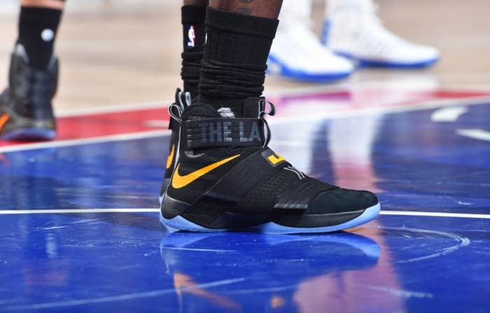 LeBron James Wearing a Black/Yellow The Land Nike LeBron Soldier 10 PE Shoes