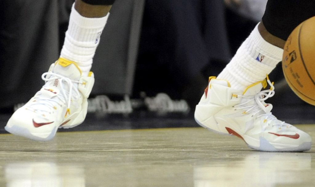 LeBron James wearing Nike LeBron XII 12 White/Yellow Red PE on January 23, 2015