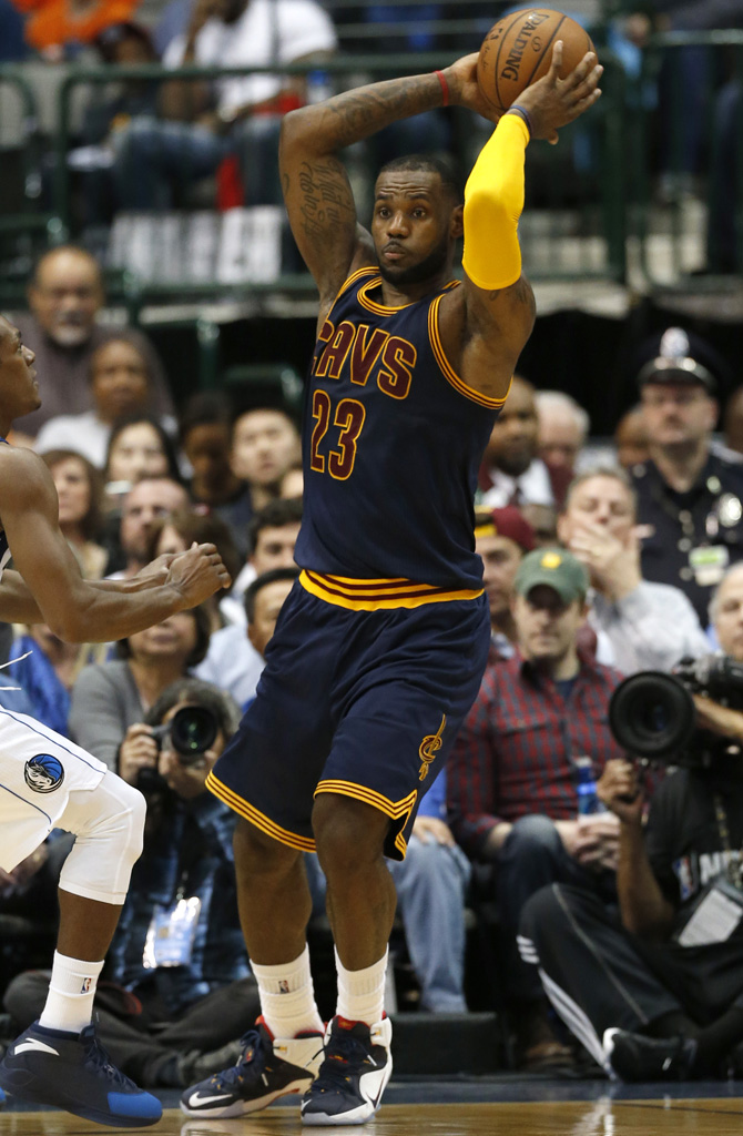 LeBron James wearing Nike LeBron 12 Navy/White-Red-Yellow PE (4)