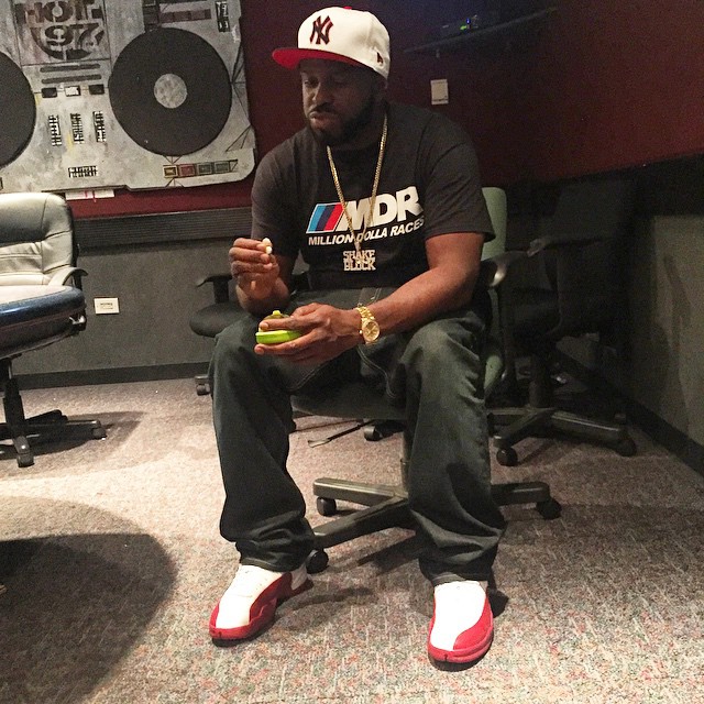 DJ Funk Flex wearing the White/Red Air Jordan XII 12