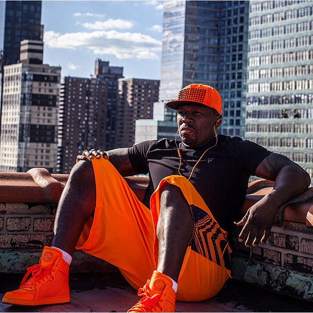 50 Cent wearing the Gucci Coda Orange