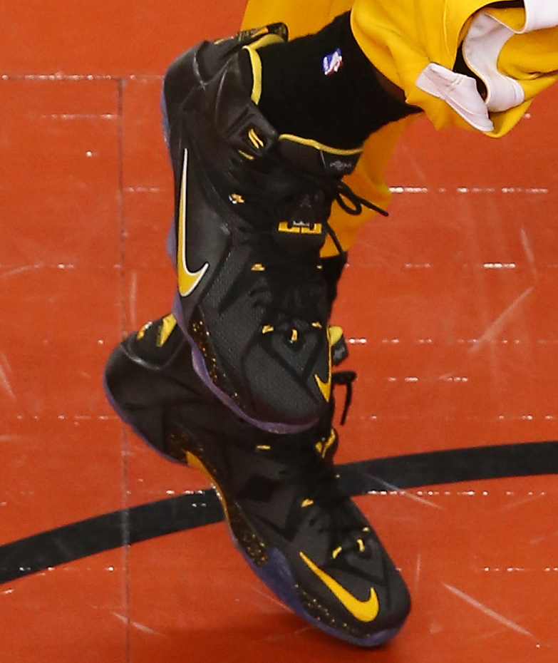 LeBron James wearing Nike LeBron XII 12 Black/Yellow PE on December 5, 2014