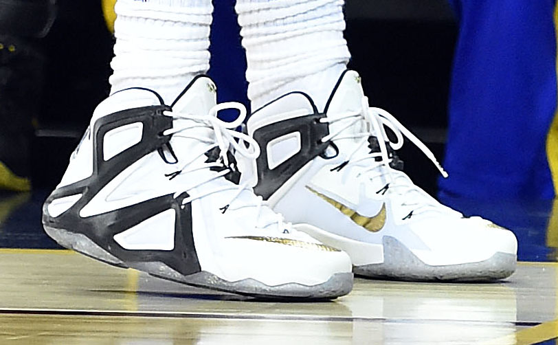 LeBron James wearing a White/Black-Gold Nike LeBron XII 12 Elite PE