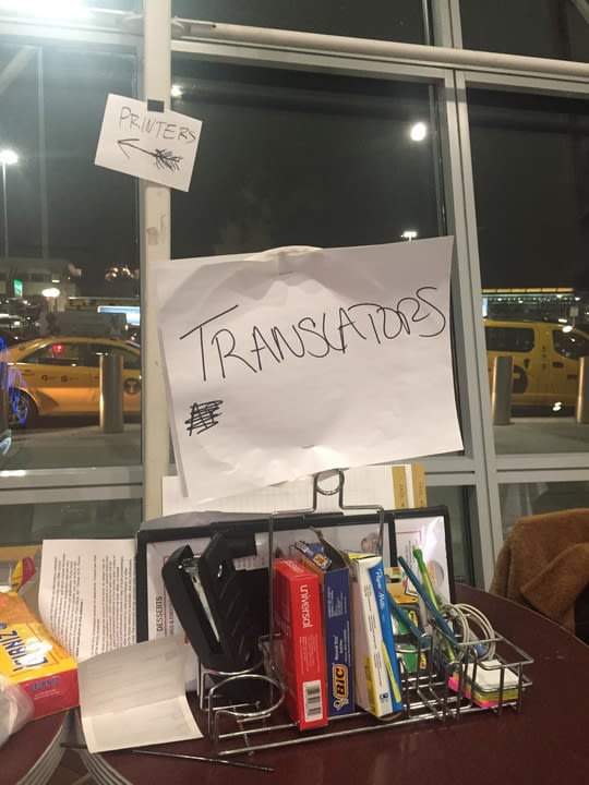 translators sign at jfk