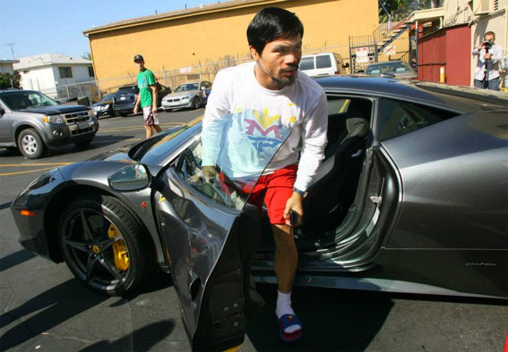 Manny Pacquiao wearing the Nike MP Solarsoft Slide