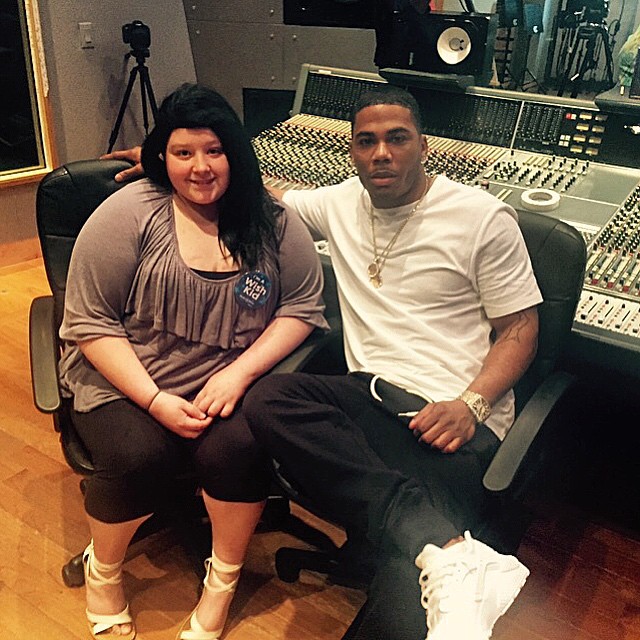 Nelly wearing a White Nike Air Huarache
