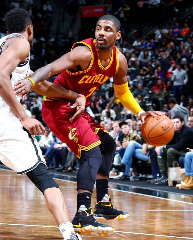 Kyrie Irving Wearing a Black/Yellow-White Nike Kyrie 2 PE (2)