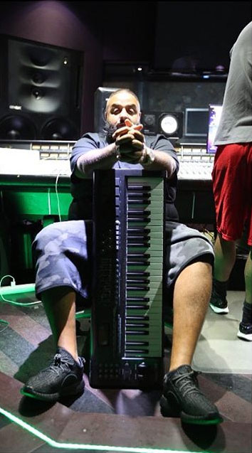 DJ Khaled wearing the &#x27;Pirate Black&#x27; adidas Yeezy 350 Boost