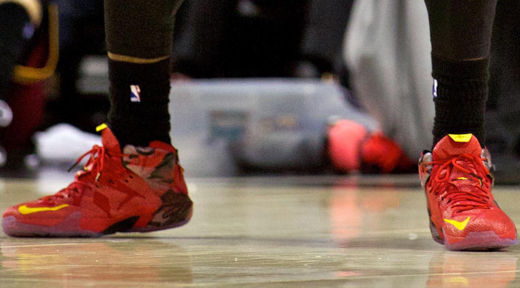 LeBron James wearing Nike LeBron XII 12 Red/BlackYellow PE on November 4, 2014