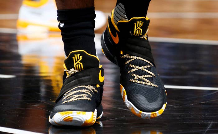 Kyrie Irving Wearing a Black/Yellow-White Nike Kyrie 2 PE (1)