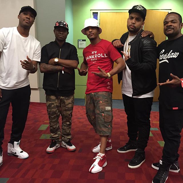 T.I. wearing the White/Red Nike Air Zoom Vick 2