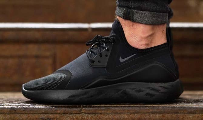 Nike LunarCharge Triple Black On Feet Profile
