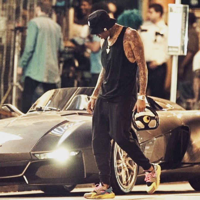 Chris Brown wearing a Nike Air Huarache iD