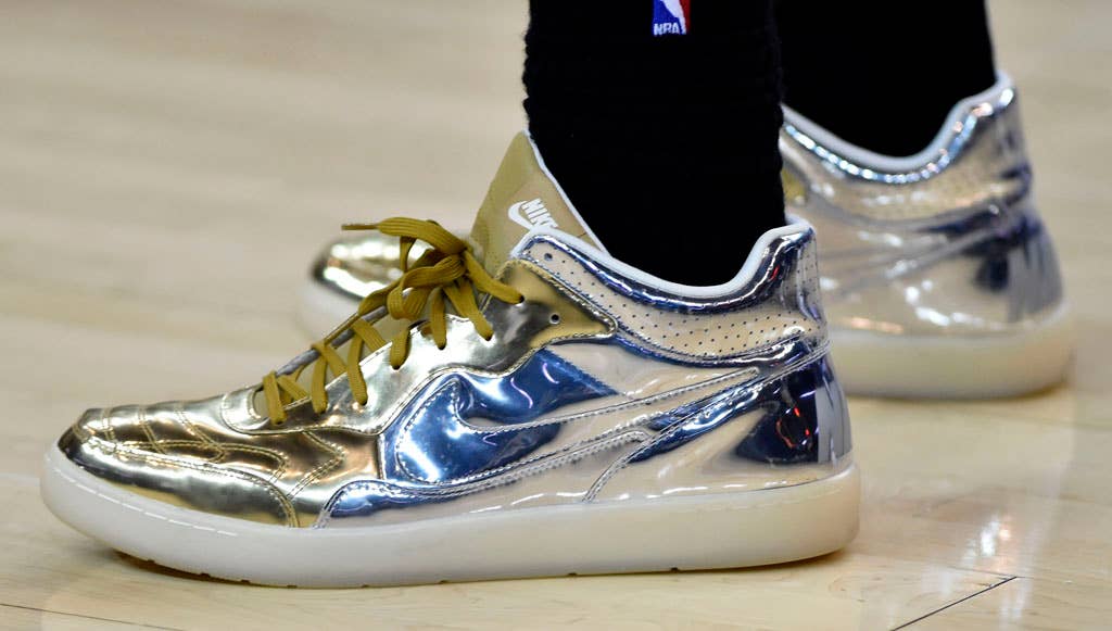 LeBron James wearing the 'Liquid Metal' Nike Tiempo '94 Mid (1)