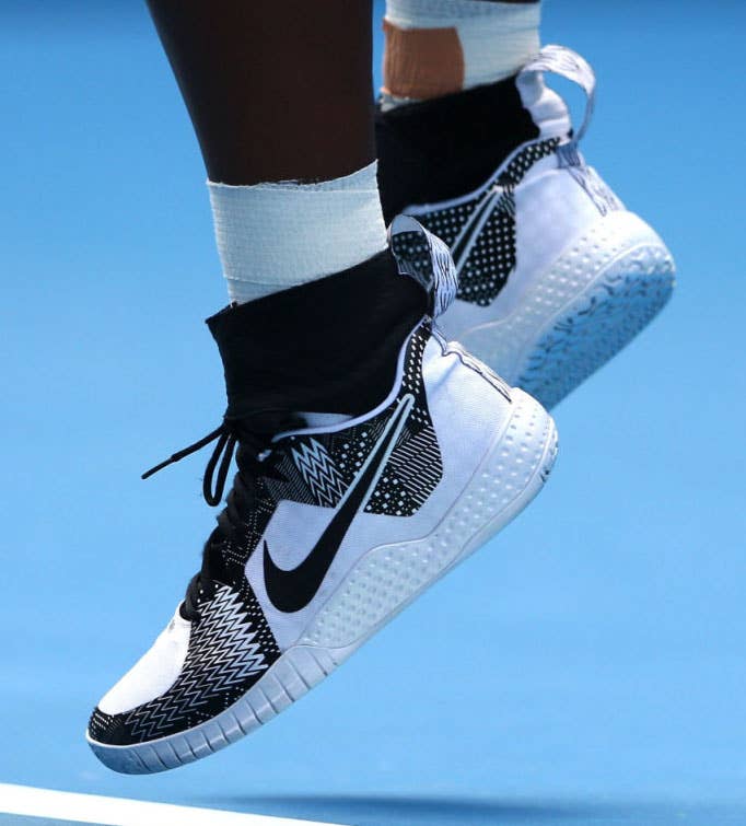 Serena Williams wearing a Black History Month Nike Tennis Shoe
