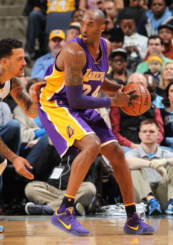 Kobe Bryant Wearing Purple/Yellow Nike Kobe 11 PE (1)