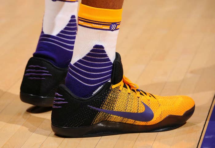 Kobe Bryant Wears Black/Yellow-Purple Nike Kobe 11 PE (1)