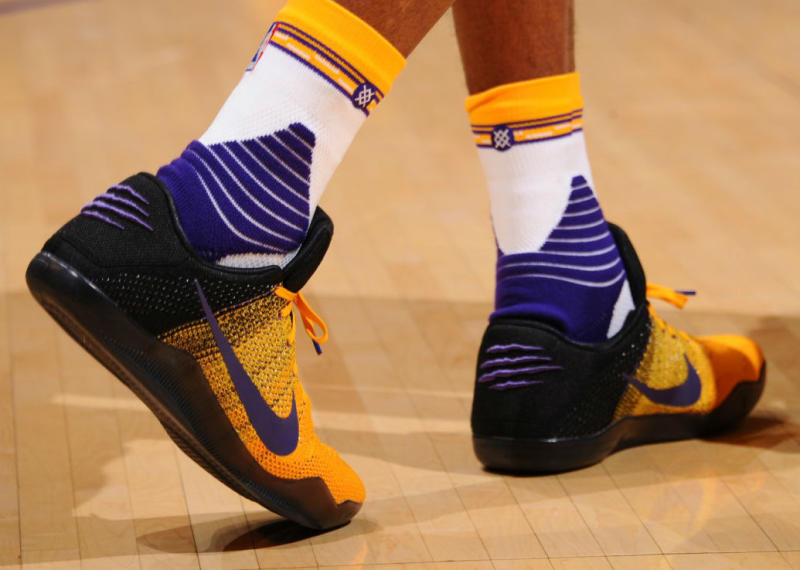 Kobe Bryant Wears Black/Yellow-Purple Nike Kobe 11 PE (2)