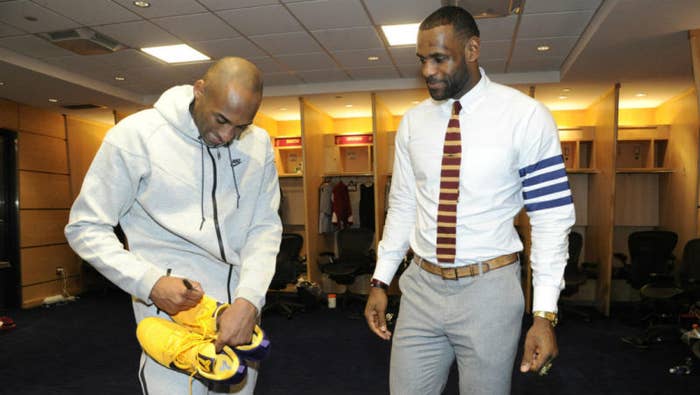 Kobe Bryant Signs Sneakers for LeBron James