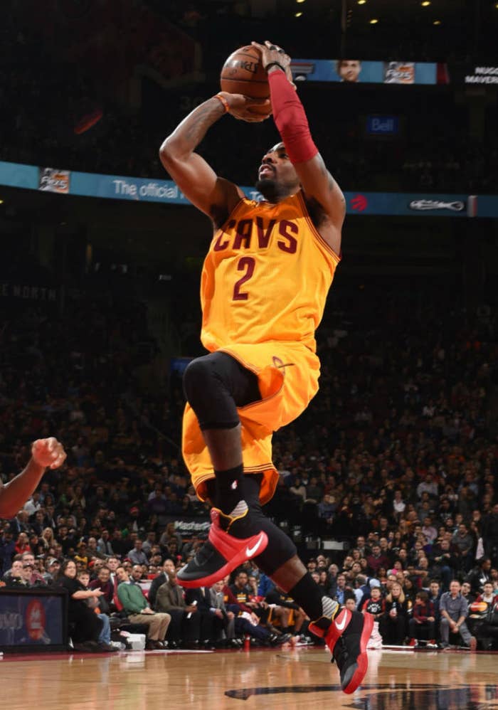 Kyrie Irving Wearing a Black/Red-Yellow Nike Kyrie 2 PE (1)