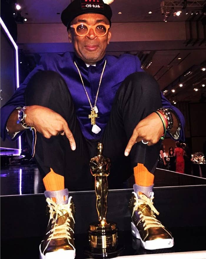 Spike Lee wearing the &#x27;Oscar&#x27; Gold Air Jordan 6