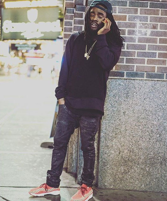 Wale wearing the &#x27;Reef Red&#x27; Nike Air Footscape Woven Chukka