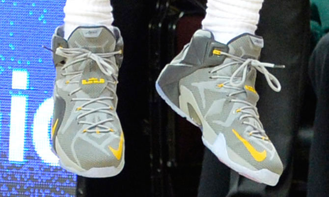 LeBron James wearing Nike LeBron XII 12 Grey/Yellow PE on November 15, 2014