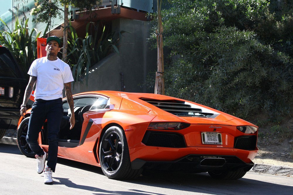 Chris Brown wearing Air Jordan V 5 CDP Fire Red (5)