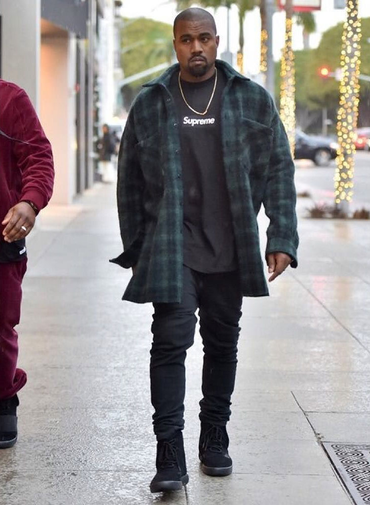 Kanye West wearing the &#x27;Core Black&#x27; adidas Yeezy 750 Boost