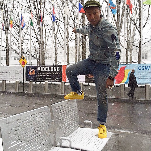 Pharrell wearing adidas Originals Superstar Supercolor Yellow