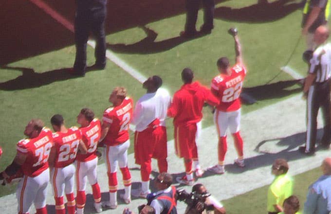Kansas City Chiefs cornerback Marcus Peters raises his fist during the National Anthem.