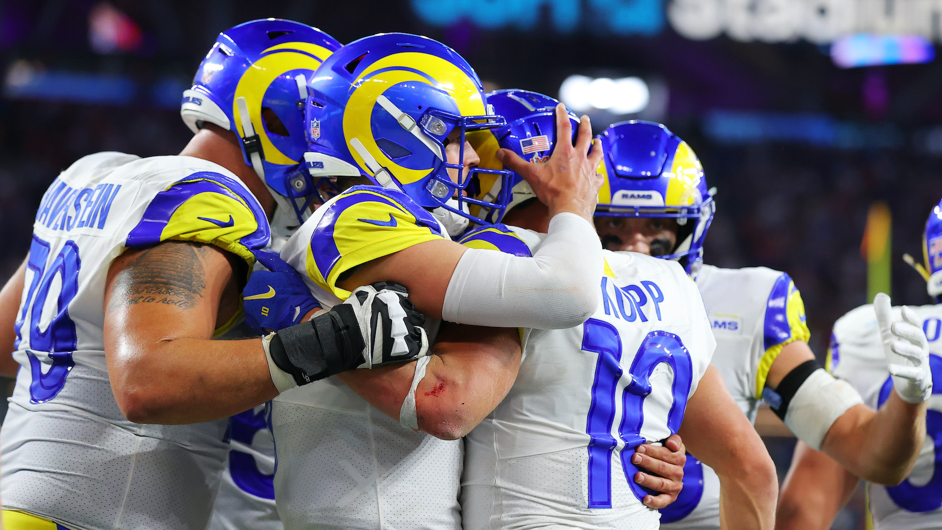 Cooper Kupp #10 of the Los Angeles Rams reacts with Matthew Stafford #9 following a touchdown reception.